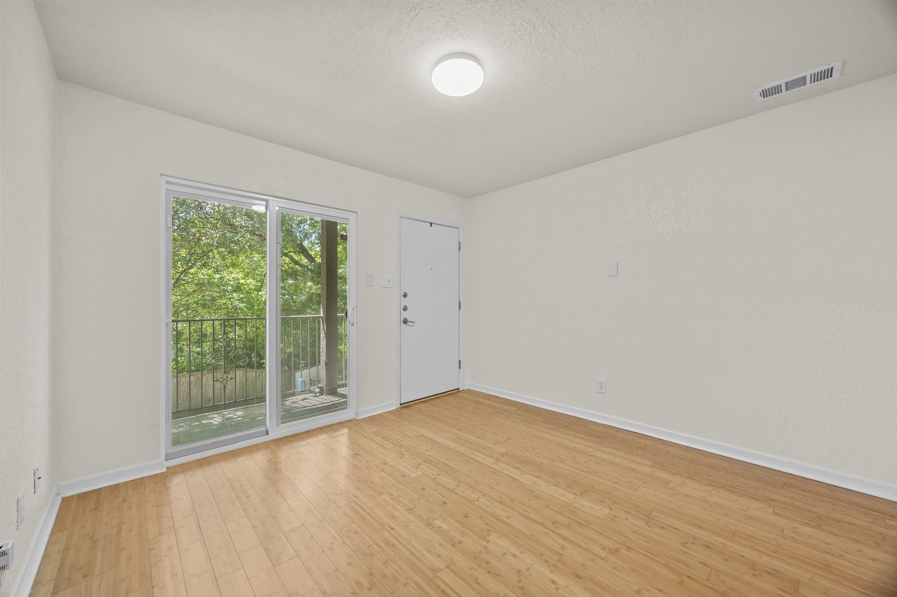 Top-Floor Condo Retreat in Gated Ivy Condos | Private Balcony + Tree-Filled Views