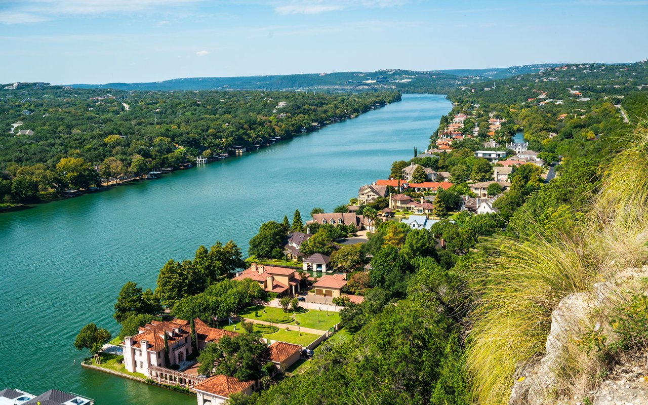 Lake Austin winds past wooded hills and waterfront homes in Westlake.