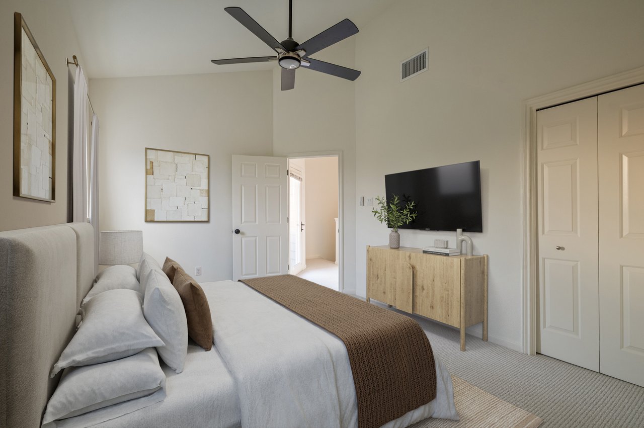 Virtually staged secondary bedroom with vaulted ceiling, ceiling fan and new carpet, Davenport Ranch, Austin 78746.
