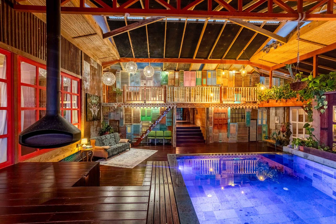 A Handcrafted Residence Immersed in Nature Above the Canopy Ocean View Architectural Home