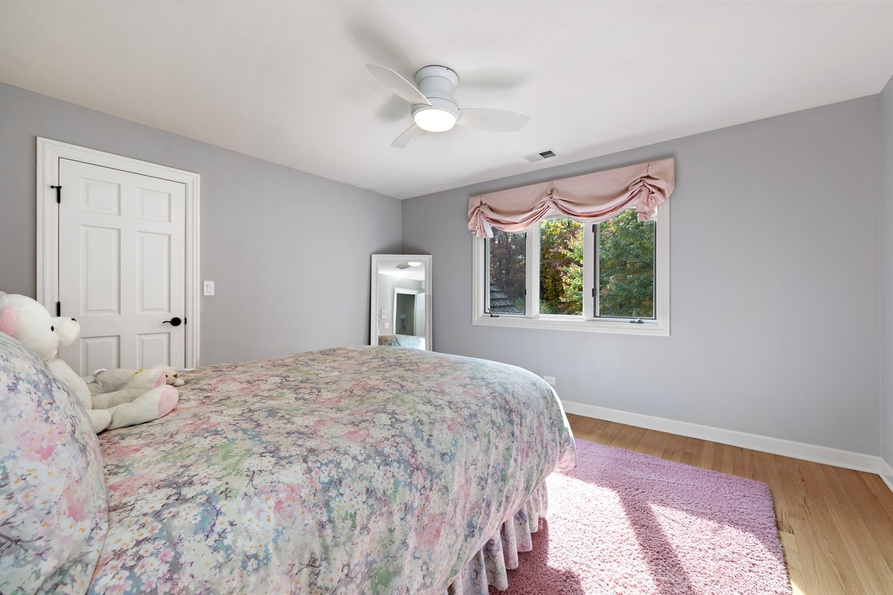 Beautifully Appointed Home in a Gated Community on Over an Acre of Professionally Landscaped Grounds with Pond Views