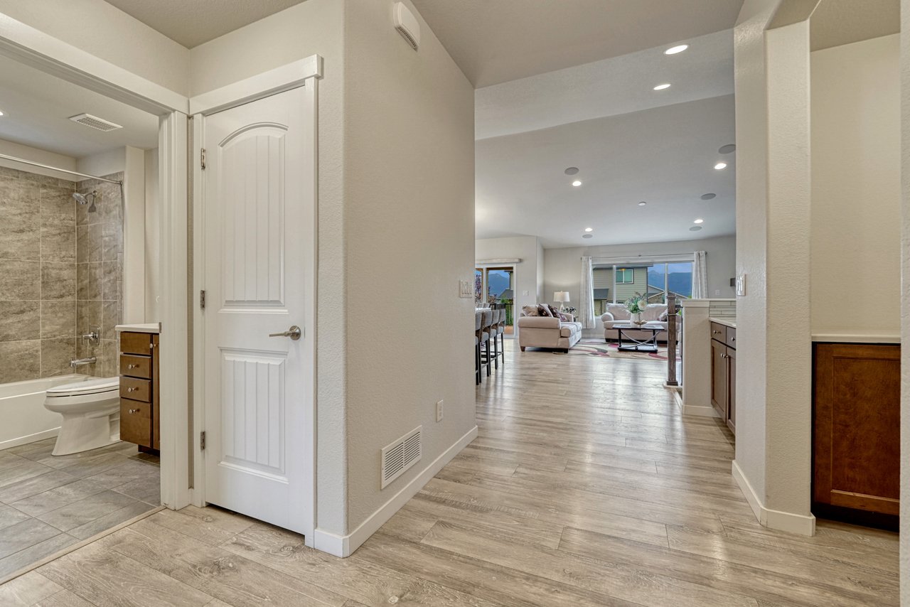 Entry hall opening to the main living area