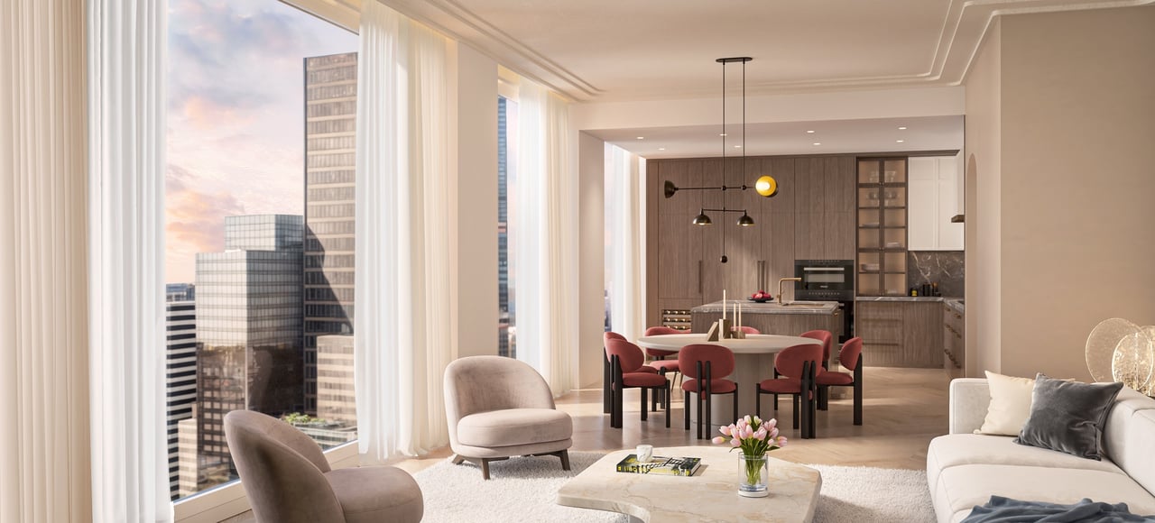 Open-plan living room and kitchen with floor-to-ceiling windows overlooking the city skyline.
