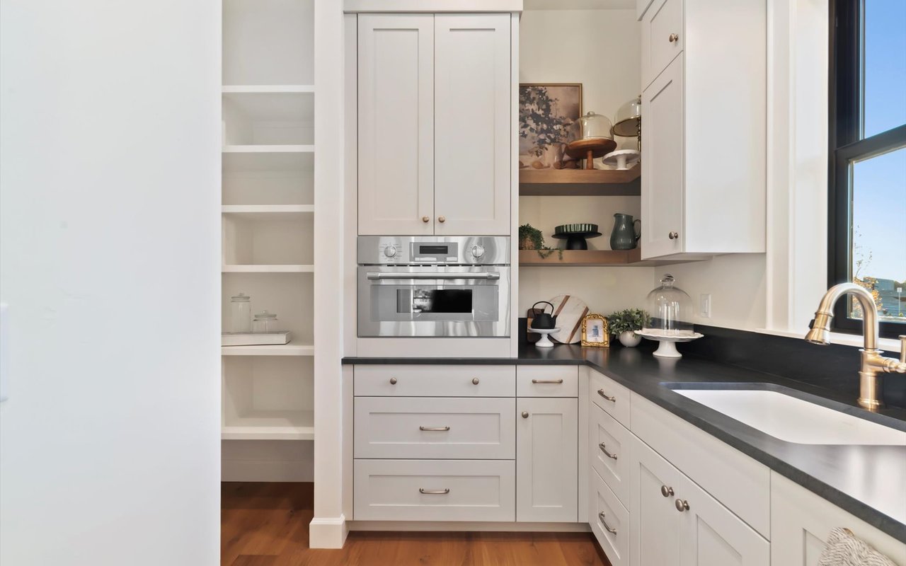 Large butlers pantry with sink, wall oven/microwave