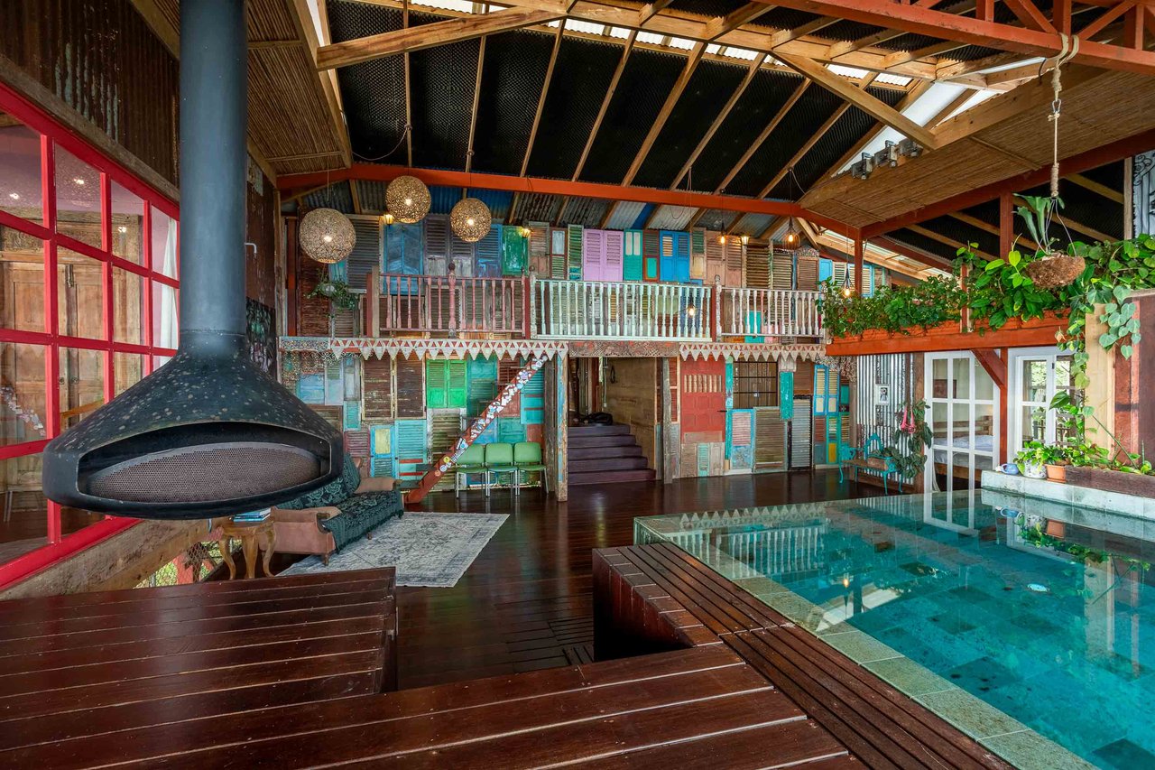 A Handcrafted Residence Immersed in Nature Above the Canopy Ocean View Architectural Home