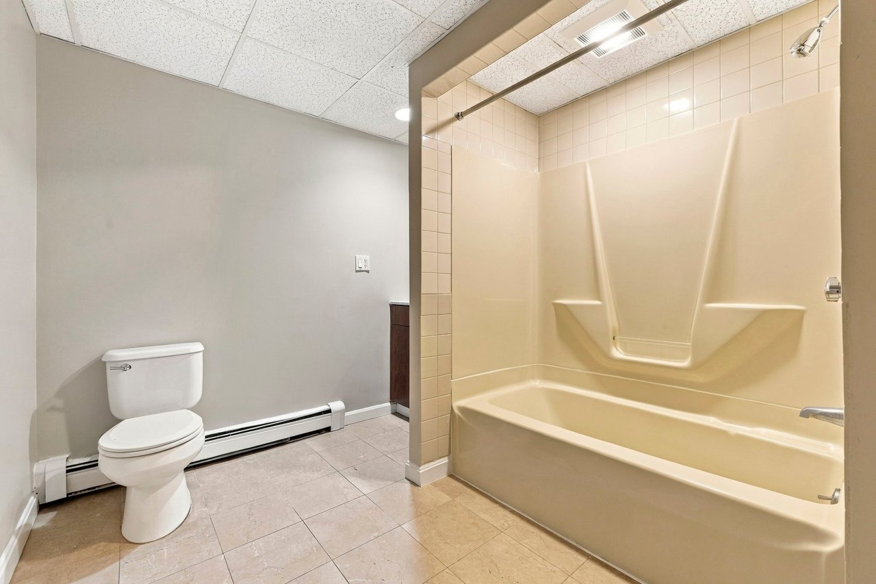 A Rare Two-Family Generational Asset with a Private Entrance to the Arnold Arboretum