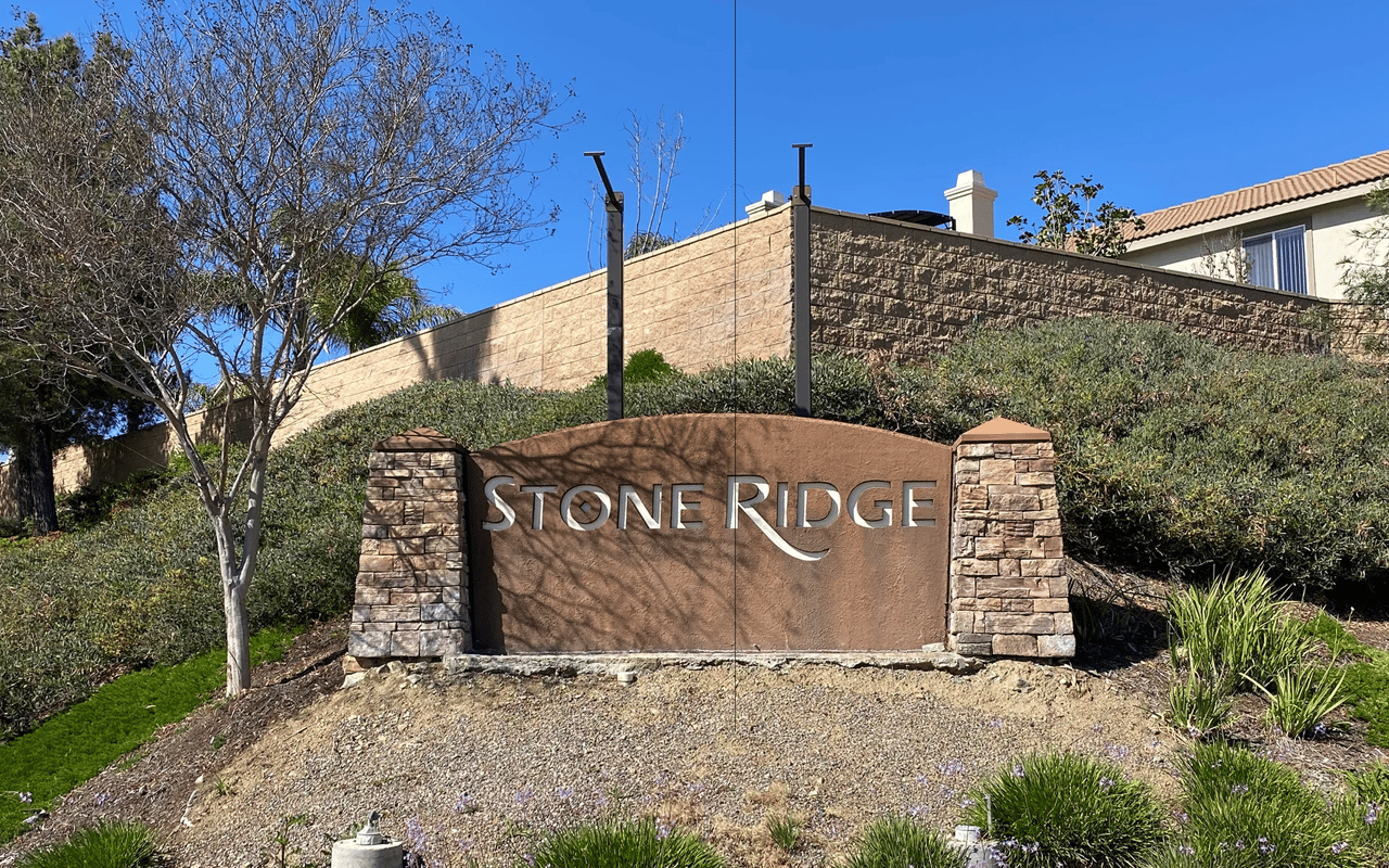 Stone monument sign marking the entrance to the Stone Ridge community in Menifee, CA.