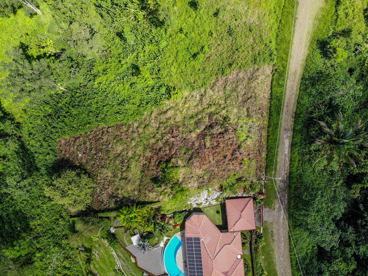 Ocean & Mountain View Half-Acre Lot in Gated Chontales Community