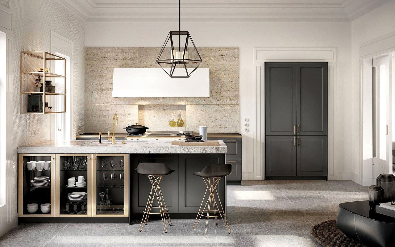 Bright kitchen with a marble island, dark cabinetry, glass-front dish storage, and two bar stools.