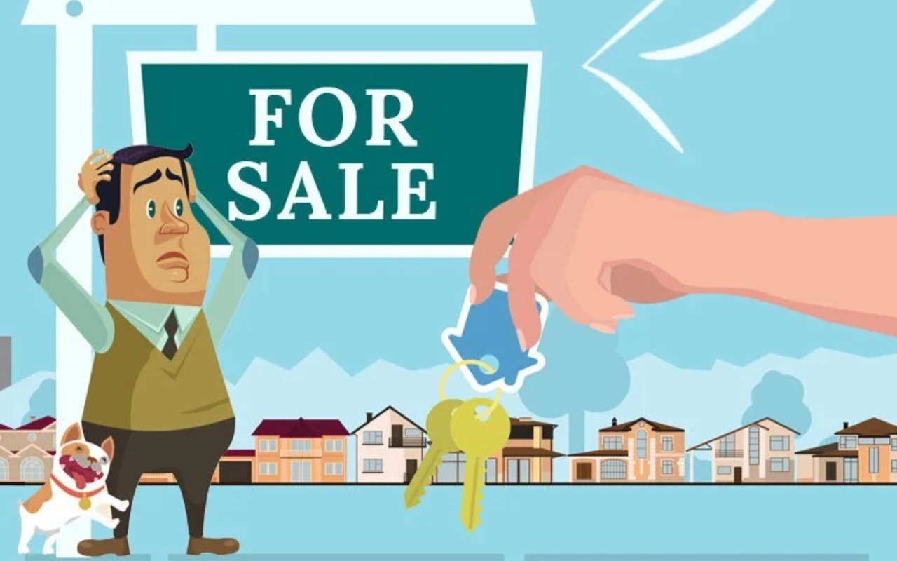 An anxious home buyer reaches toward keys beside a FOR SALE sign and a row of houses.