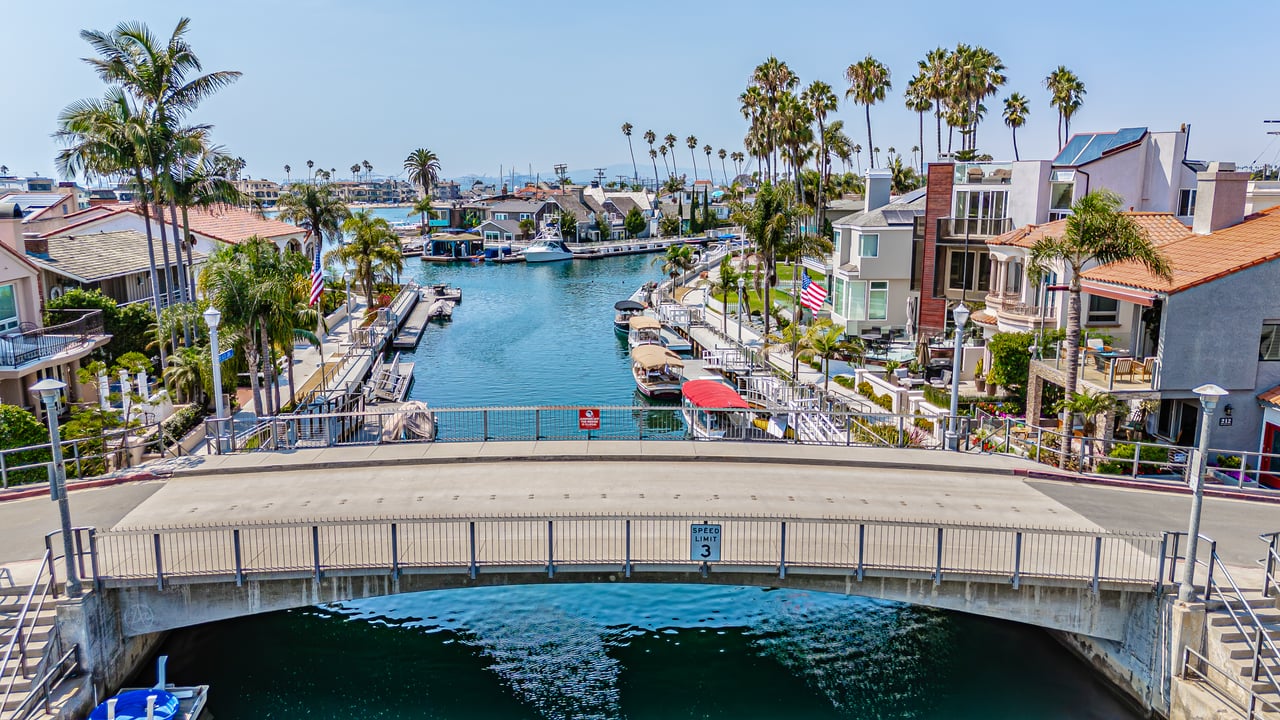Bridge over the Naples Island canal with waterfront homes in Long Beach, California