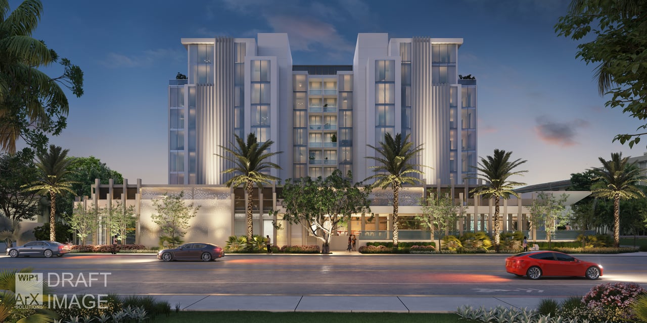 Modern multi-story residential building with illuminated windows, palm trees, and landscaped grounds at dusk.