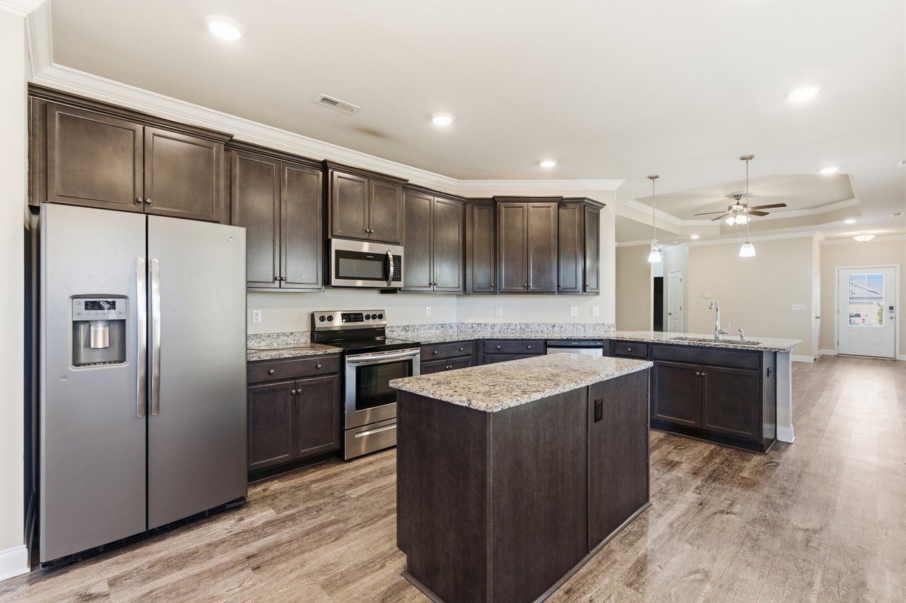 Corner Lot 3 Bed 2 Bath New Market Home with Community Pool!