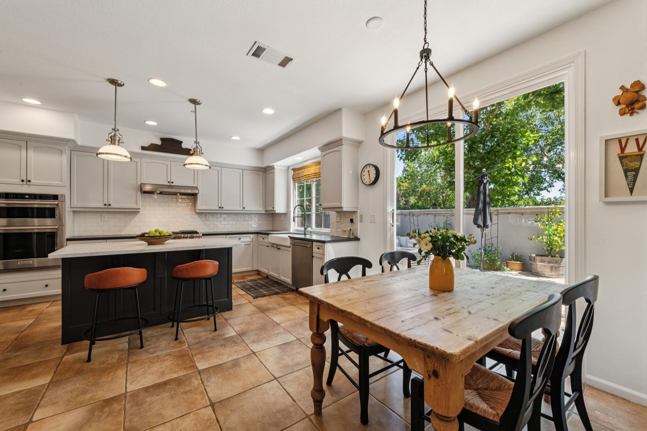 Bright dining space featuring elegant finishes and comfortable gathering opportunities.