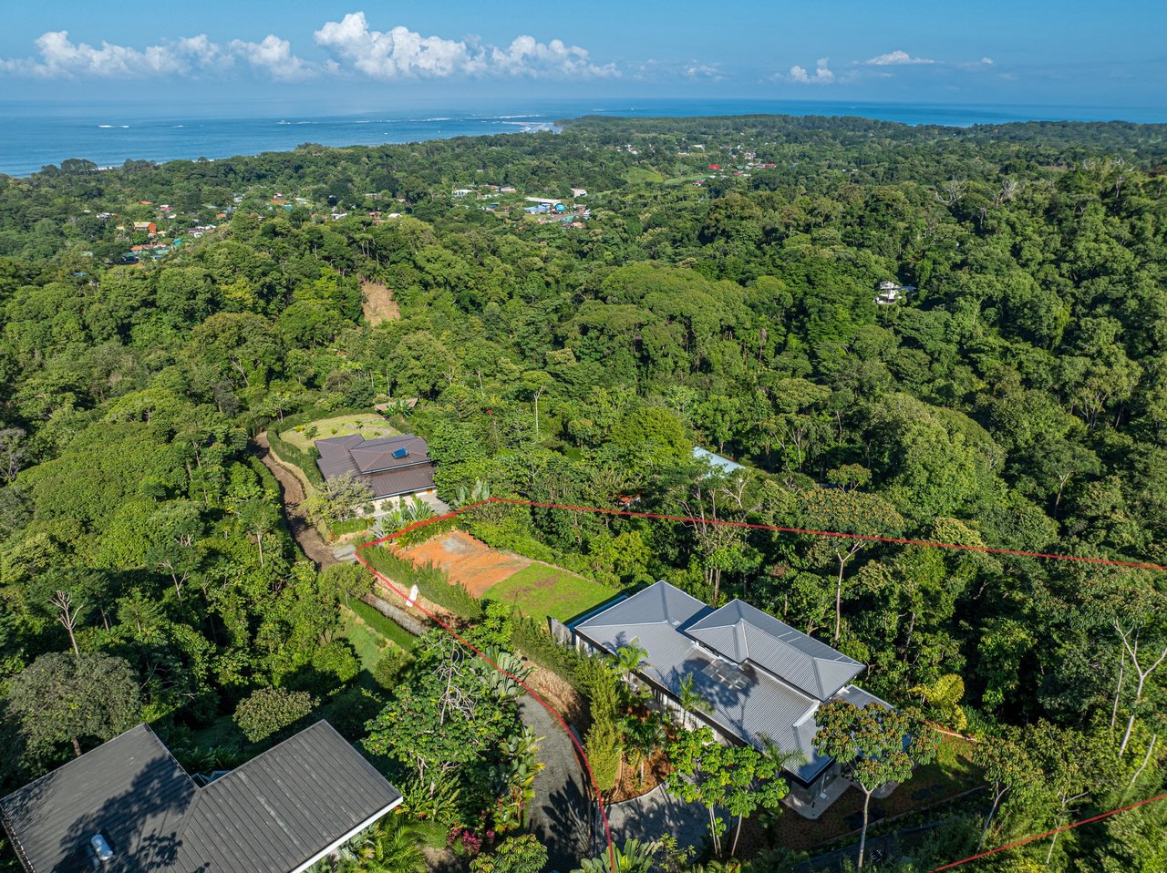 New contemporary tropical villa boasts with a movie theater and views of the iconic whale’s tail