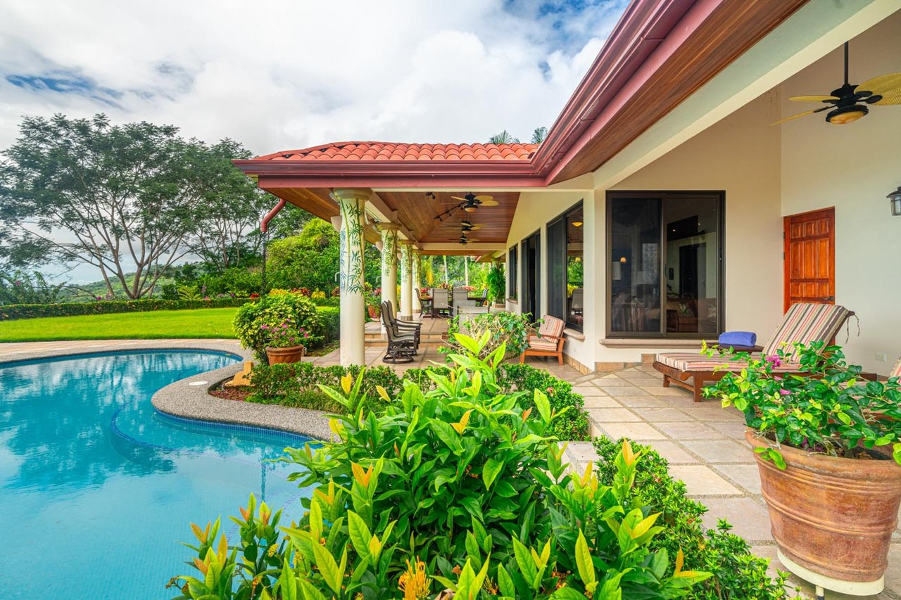 Ocean, jungle & mountain views on a meticulously landscaped 3-home family compound