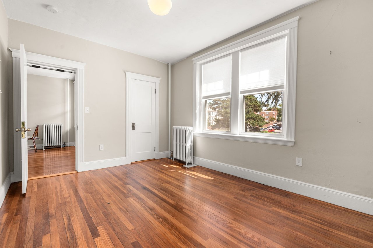 Bright by Design: A Fully Updated Corner Unit on South Huntington