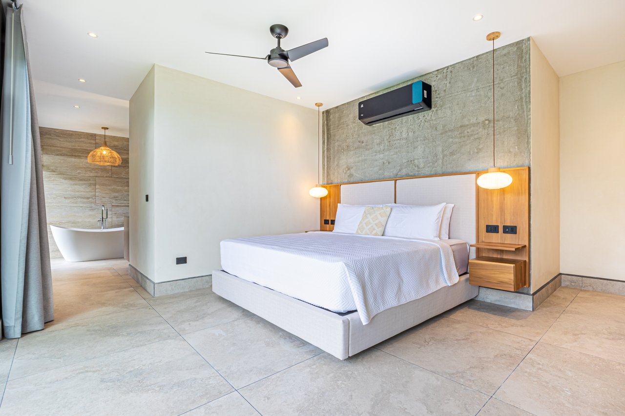 New contemporary tropical villa boasts with a movie theater and views of the iconic whale’s tail