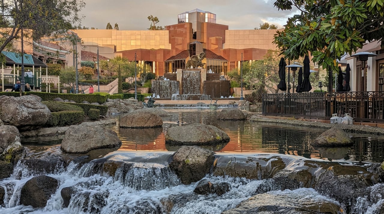 Scenic outdoor water features, tiered waterfalls, and central plaza architecture at Blackhawk Plaza in Danville, California