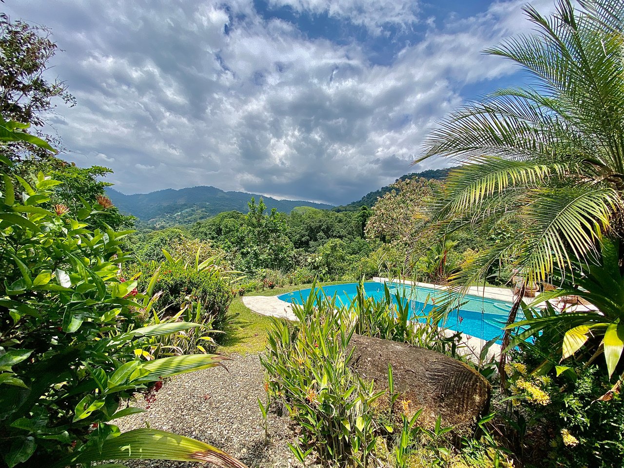 Charming 2-Bedroom Villa on 5 Acres with Creek Access and Income Potential