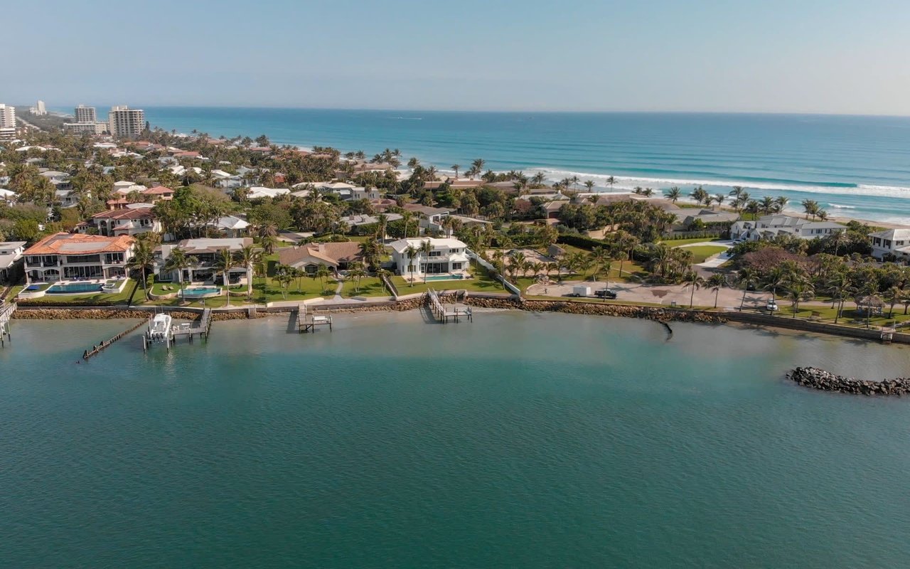 an aerial photo of waterfront homes along the beach in Jupiter