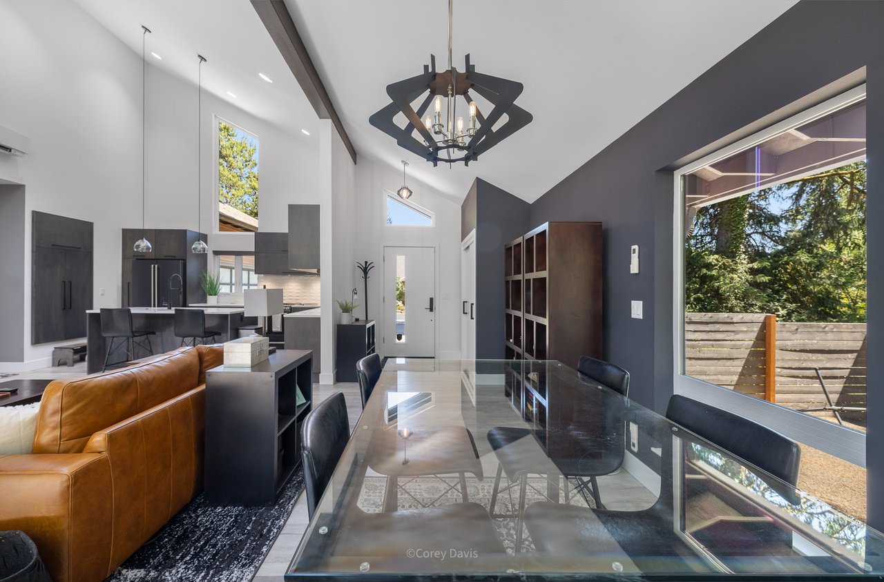 Sold architect-designed custom home at 35160 Ponderosa Loop in Manzanita Oregon with wooded greenbelt privacy