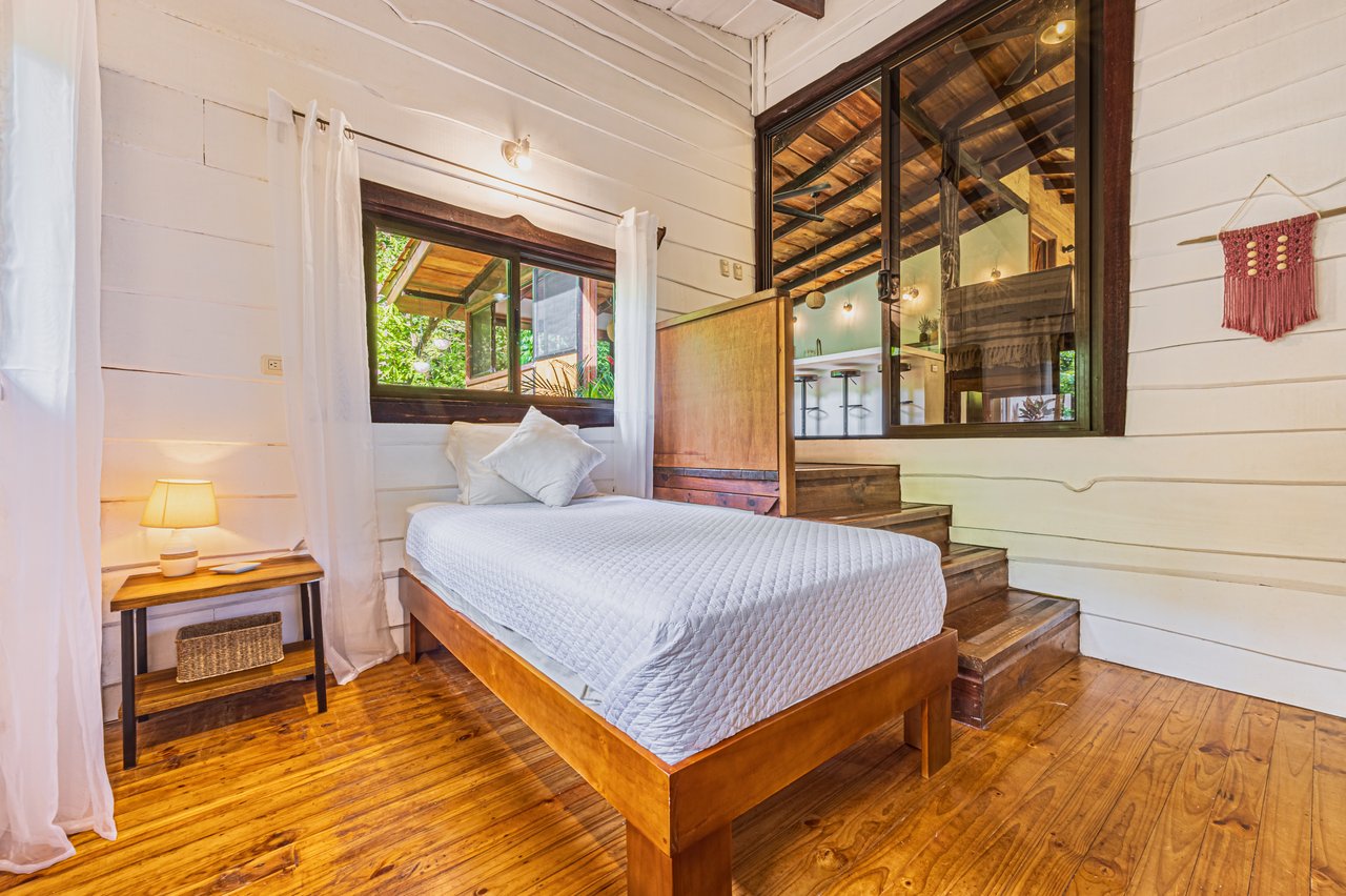 A Jungle House Built of Wood & River Dreams