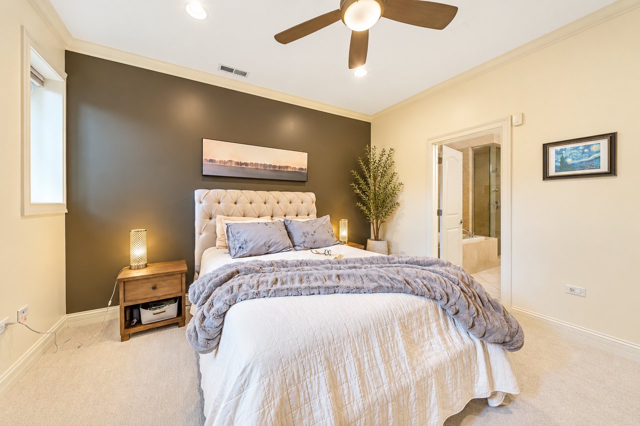 Primary bedroom in the Irving Park duplex condo
