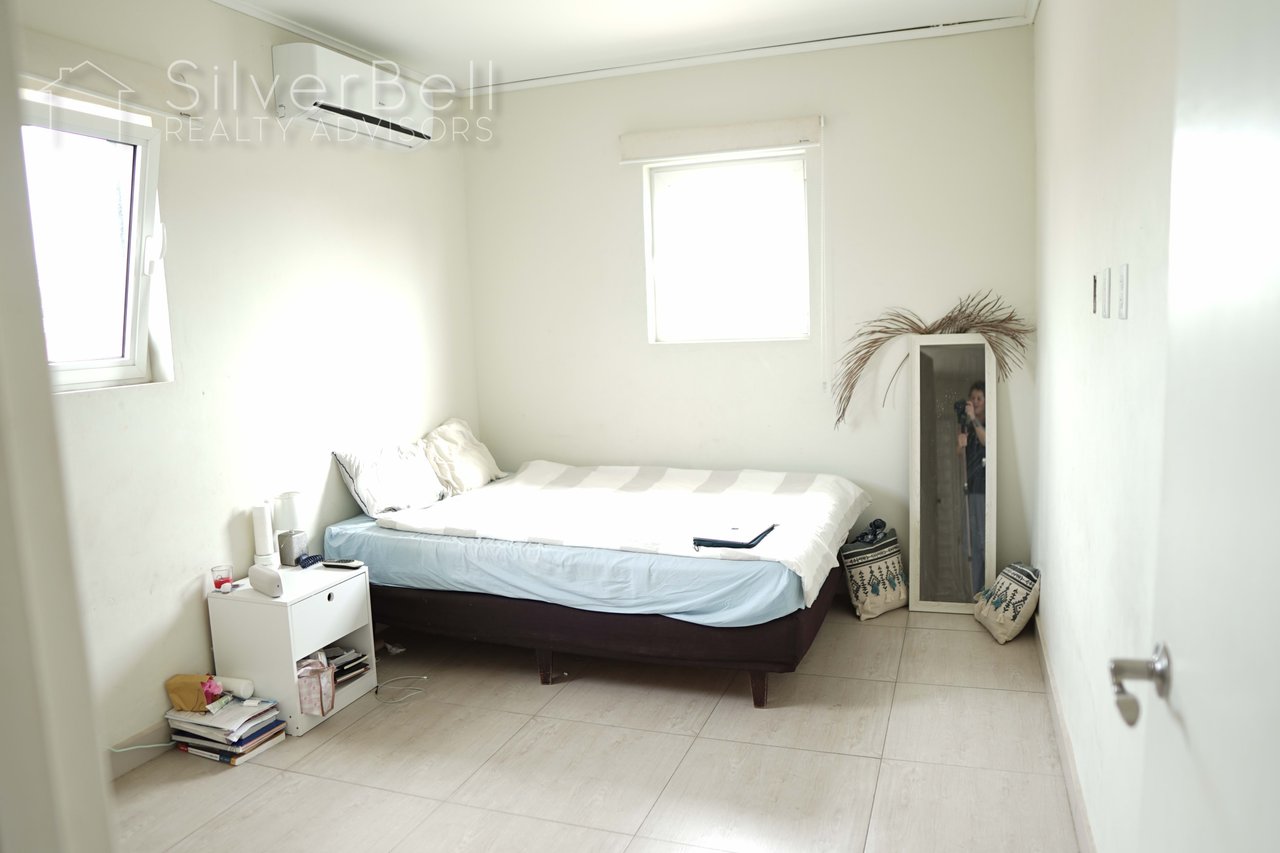 Welcome to this fully furnished apartment, located in Amandelweg, Dominguito, Curaçao where every bedroom is equipped with air conditioning and 5 minutes away from Mambo Beach. SilverBell Realty Advisors - Curaçao