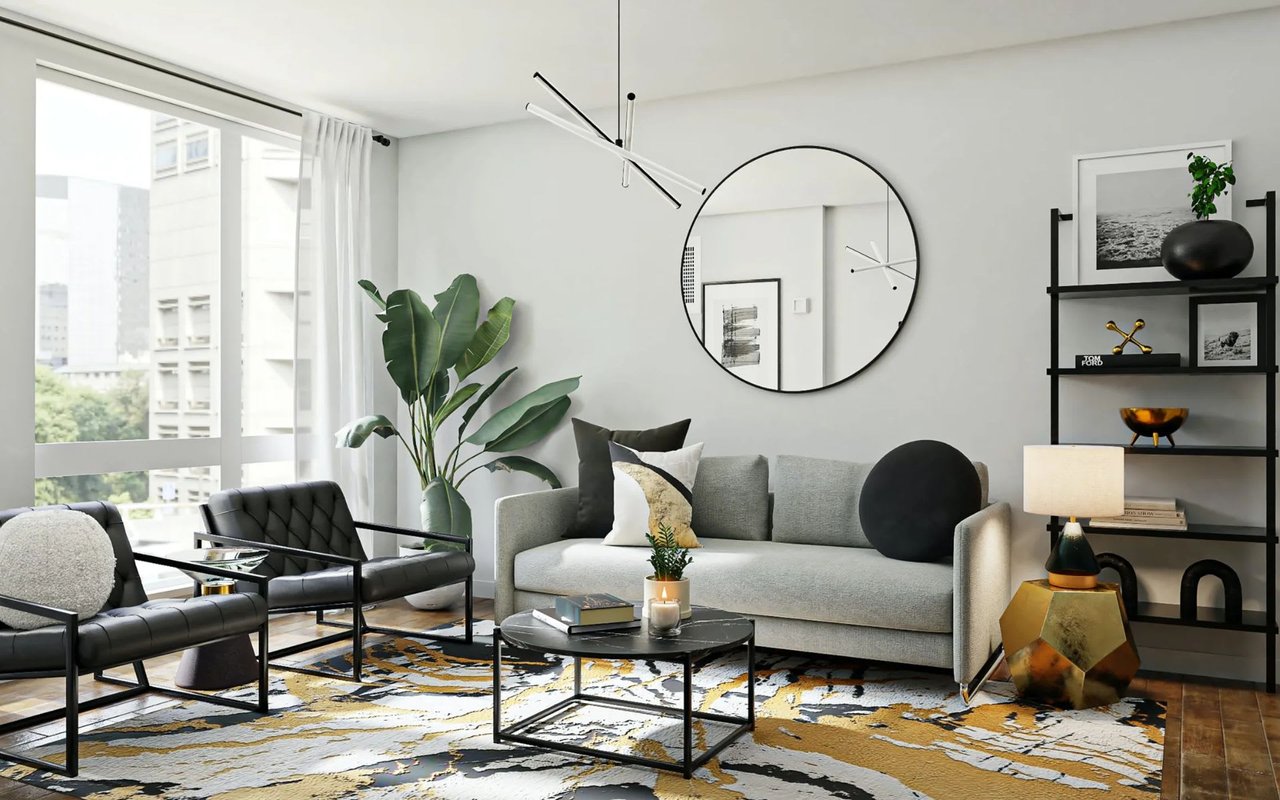 A modern living room with a couch, chairs, coffee table, pendant light, mirror, houseplants, and floor-to-ceiling windows.