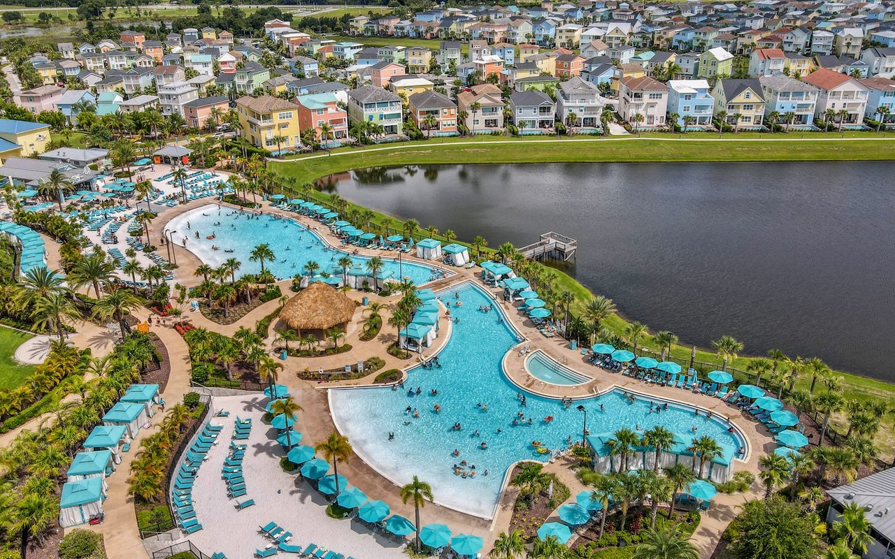 An aerial view of the Margaritaville Resort Orlando water park, with water slides, a lazy river, and multiple swimming pools.