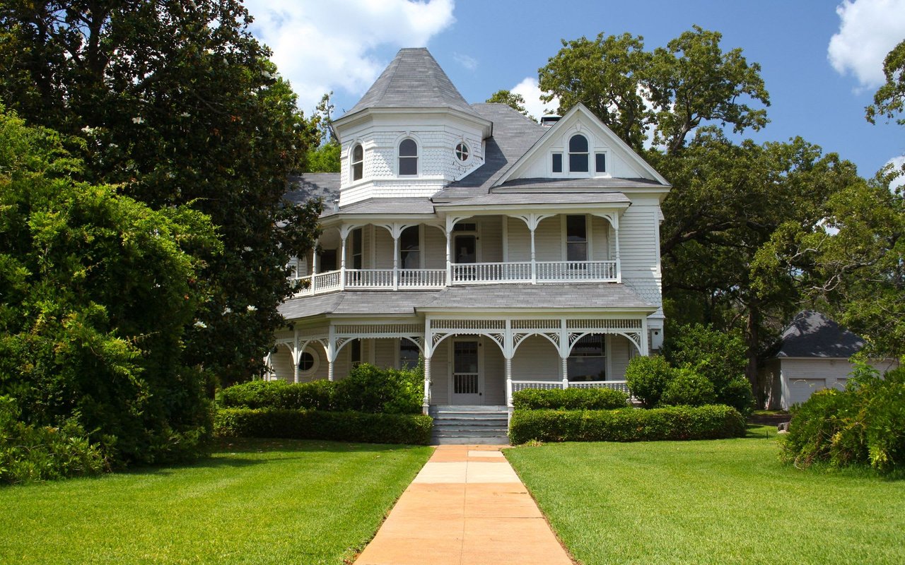 a beautiful old two-story house in West University