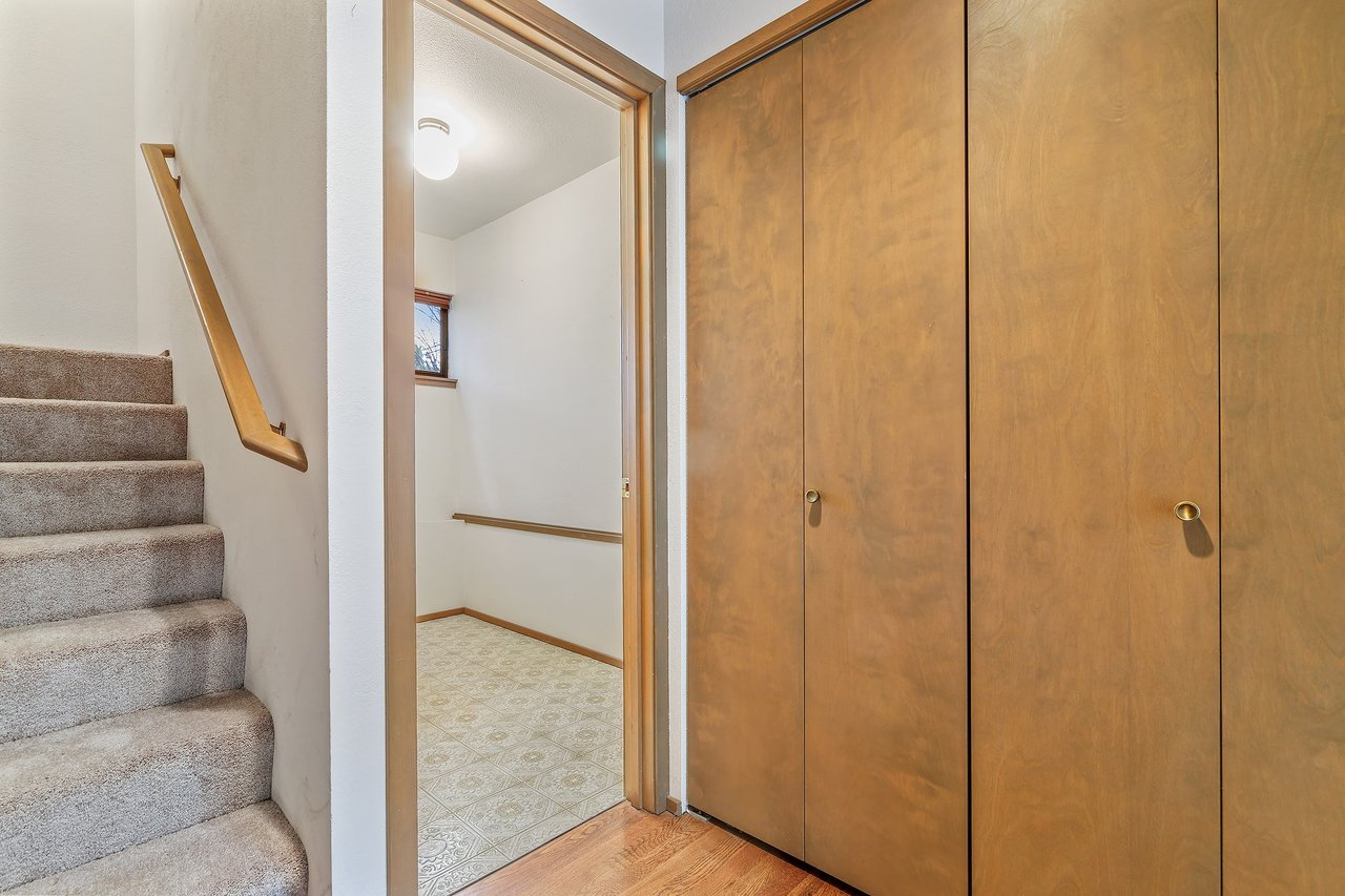 Elevate your daily routine with the convenient and aesthetically pleasing first-level entrance of this tri-level townhome.