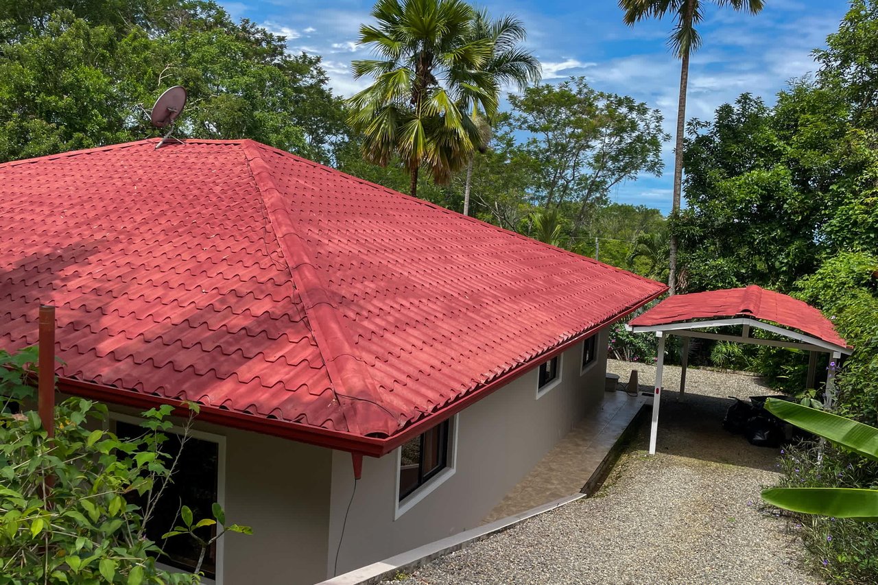 Turnkey Spacious Home with Open Layout, Pool & Small Ocean View in Ojochal Gated Community