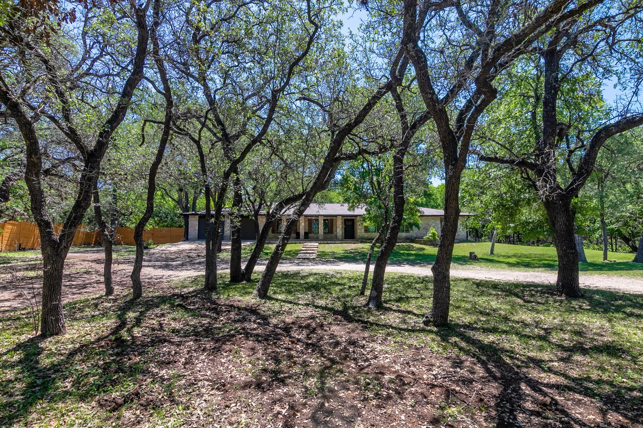 Updated, unrestricted Hillcountry Gem nestled in the Live Oak Trees