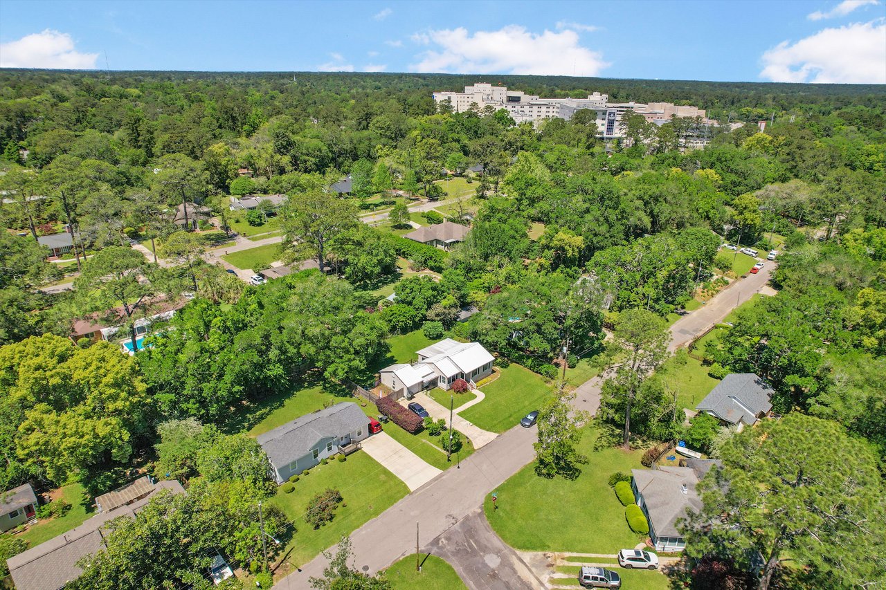 Another aerial view of the Capital Hills neighborhood, highlighting the residential layout and tree cover.