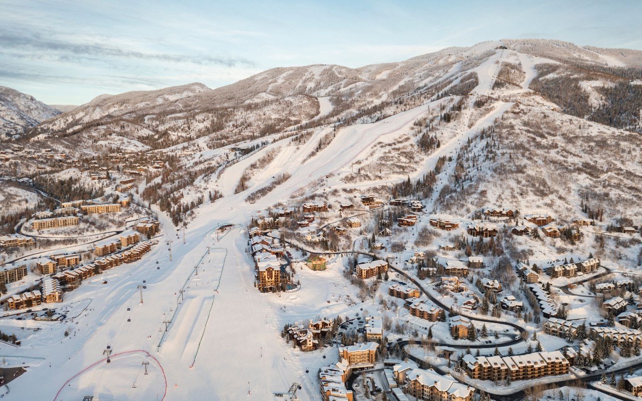 An aerial view of a winter wonderland ski resort