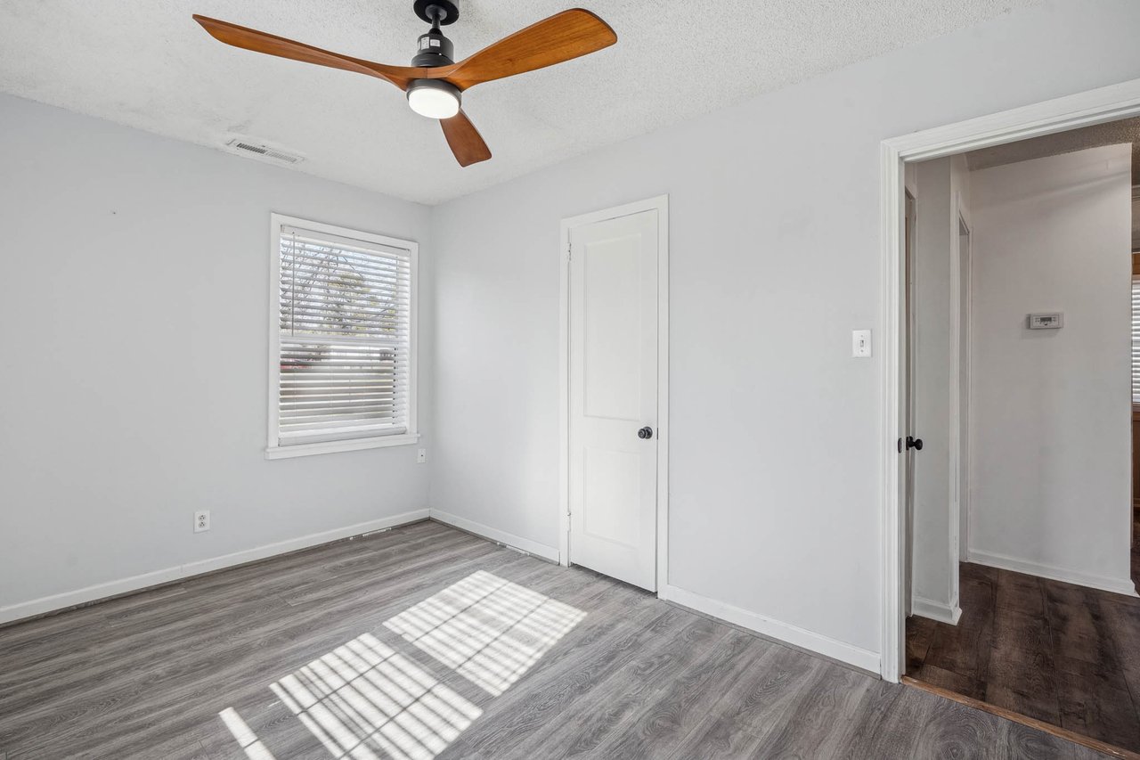 LARGE corner lot in Huntsville! New floors, new paint, renovated bathroom! Great Price!