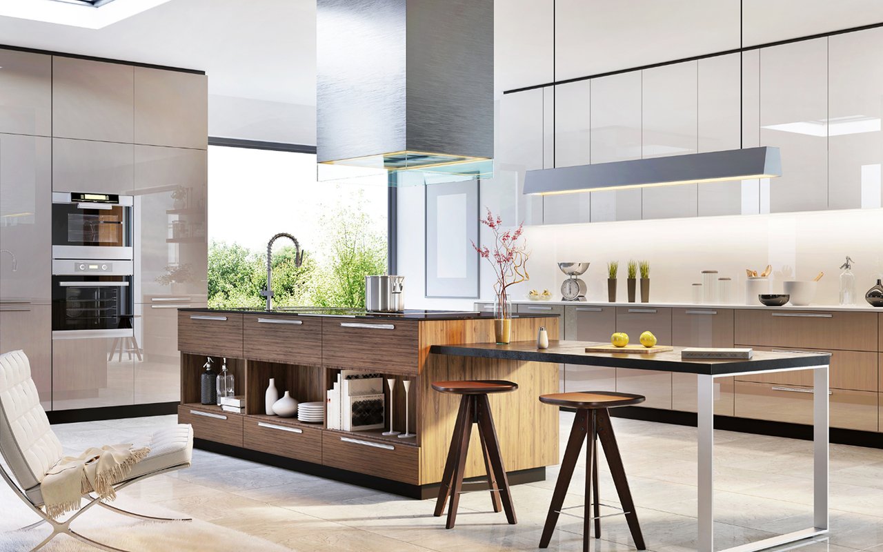 Contemporary kitchen with a wood-front island, breakfast bar, and built-in double ovens.