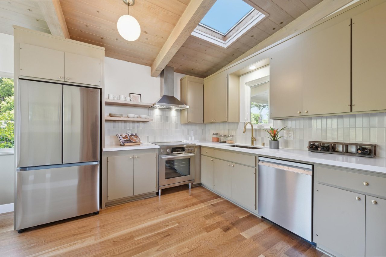 Midcentury modern home in Kensington with original cabinets and Heath tile backsplash