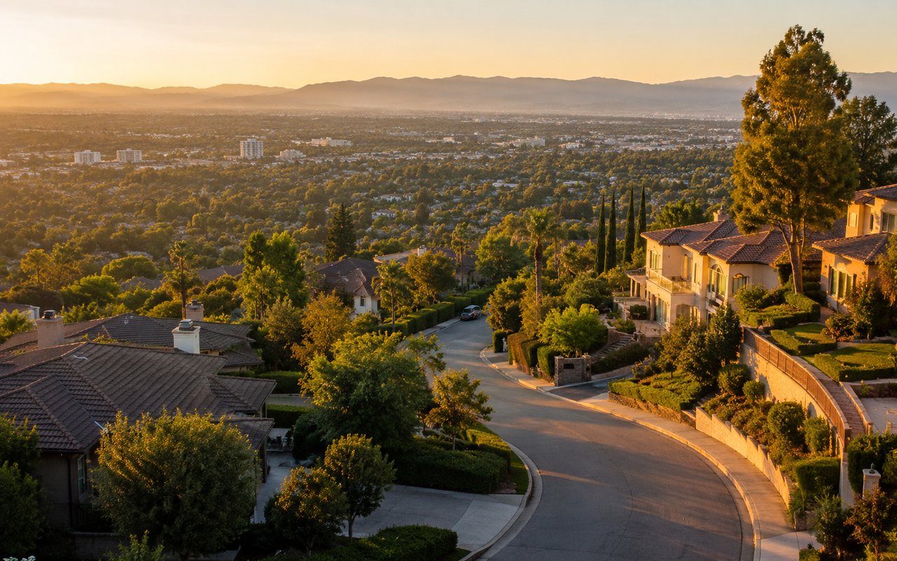 Upscale residential street with large homes and mature trees in Encino, San Fernando Valley