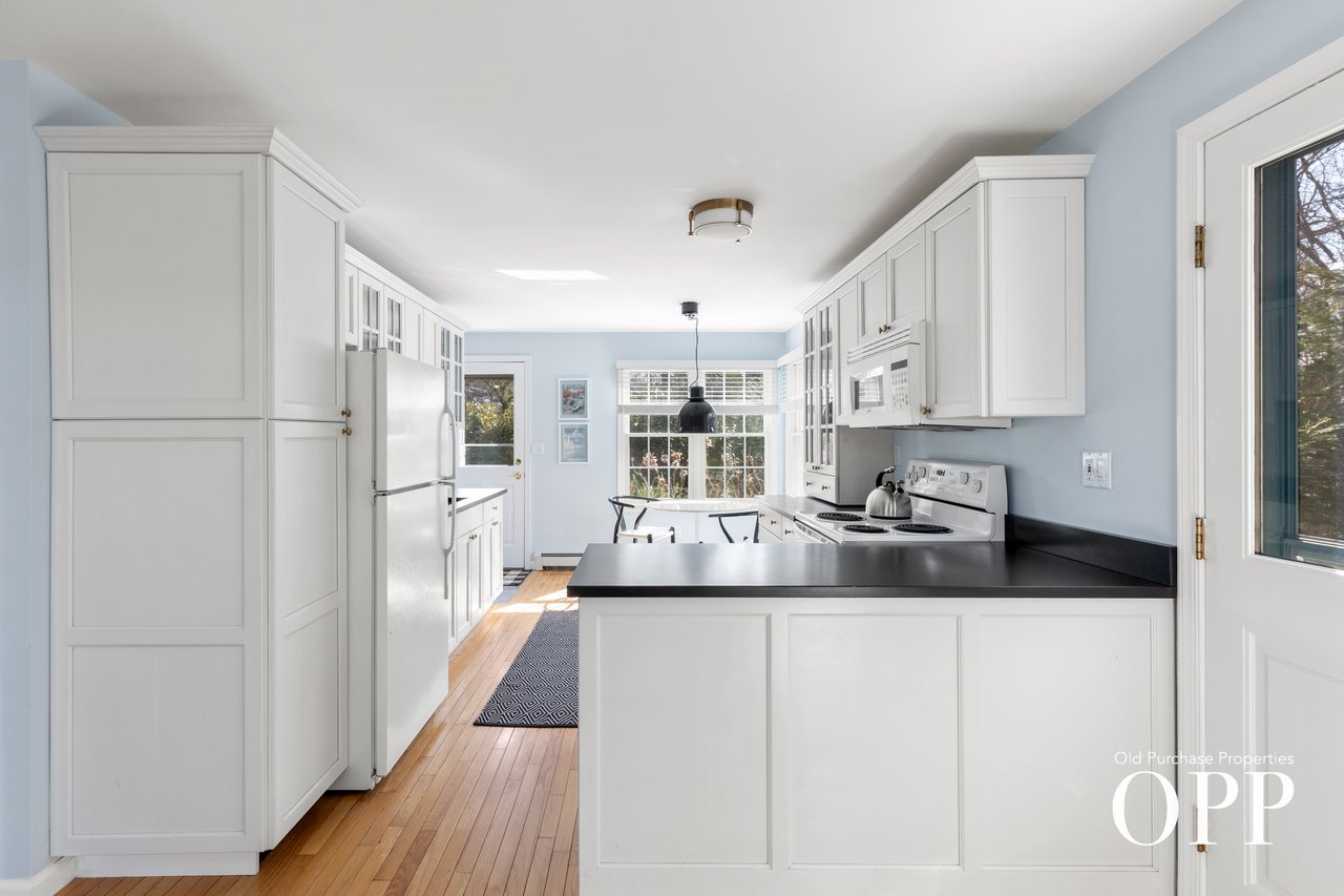 An Expanded Cape with a Private Wing, Set by the Preserve