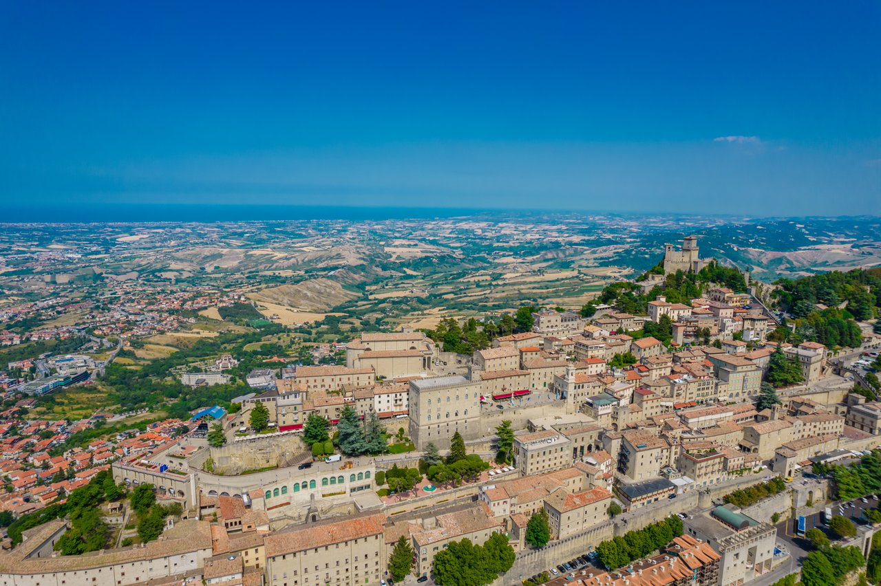 San Marino’s historic center and fortress atop a hill, overlooking the surrounding countryside.