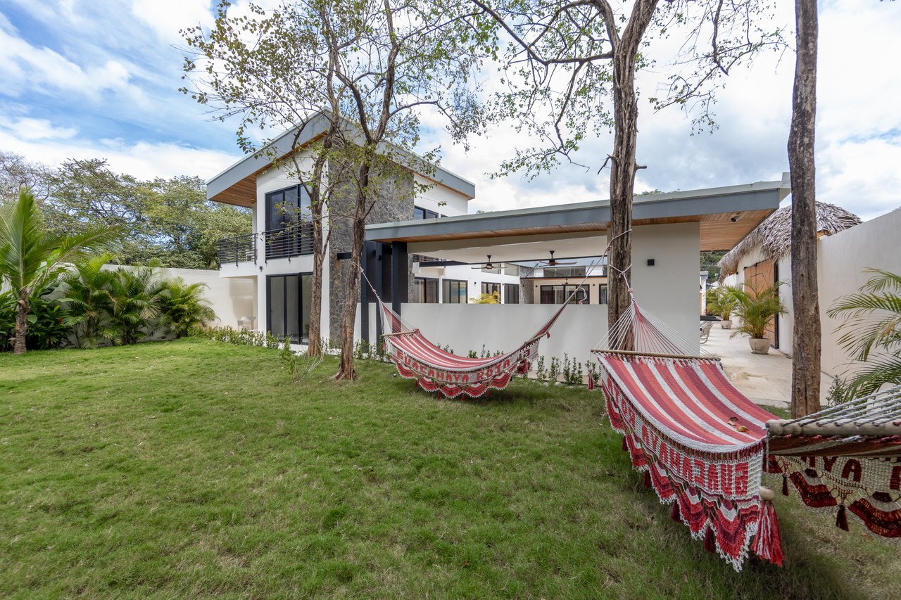Casa Guacamaya Roja Lot B20 | Elegant 4-Bedroom Home with Pool & Outdoor Kitchen, Steps from Playa Grande Beach, Costa Rica