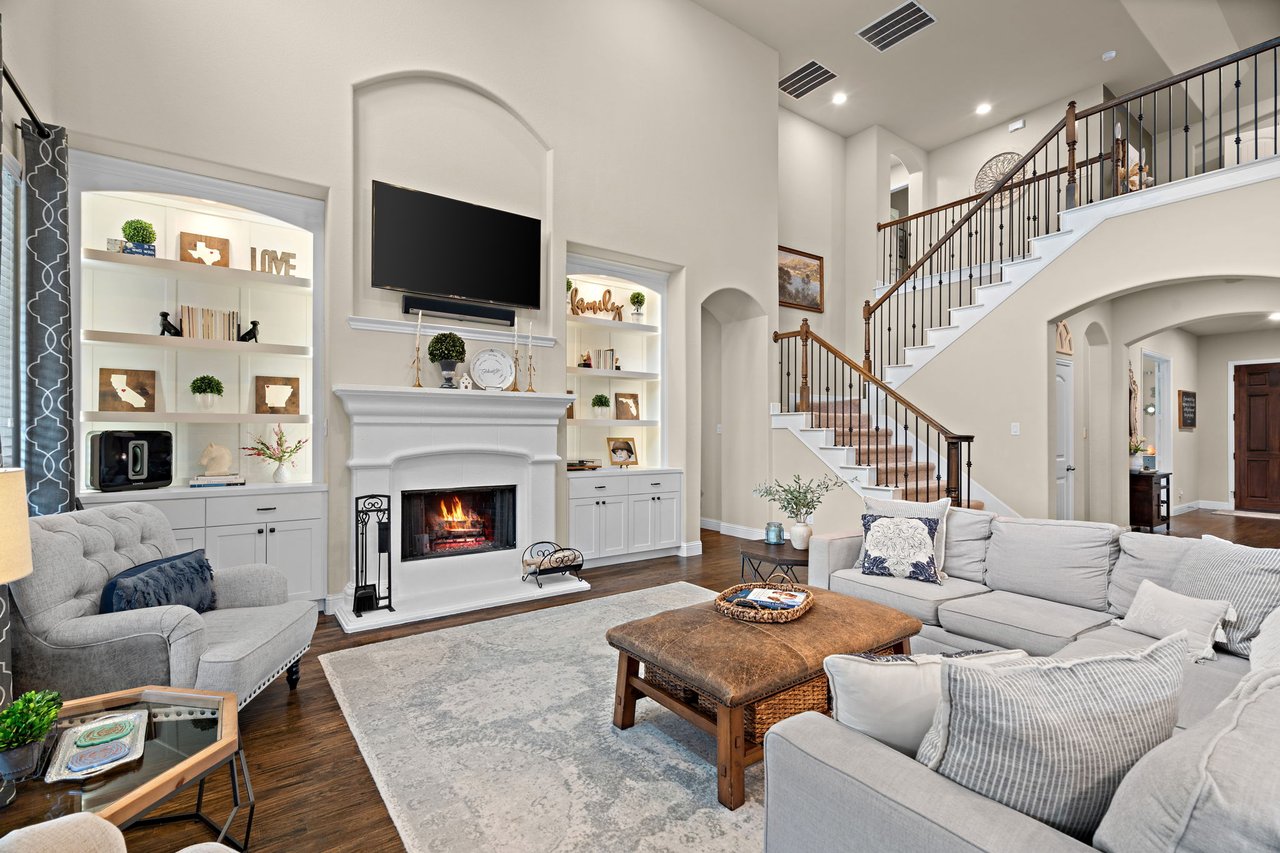 clean staged living room ready for sale with neutral decor natural light and decluttered space