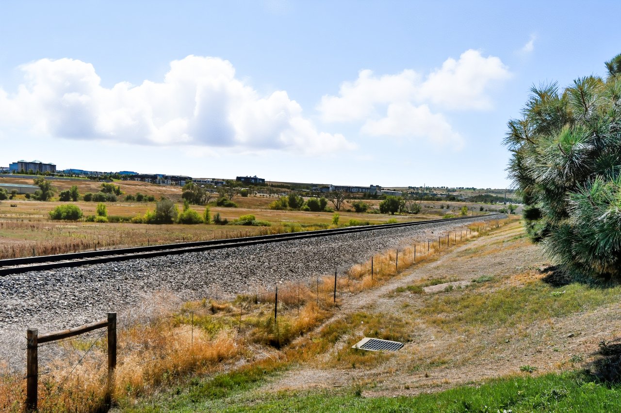 Open grassy field in the Via Varra neighborhood of Broomfield, Denver, CO.