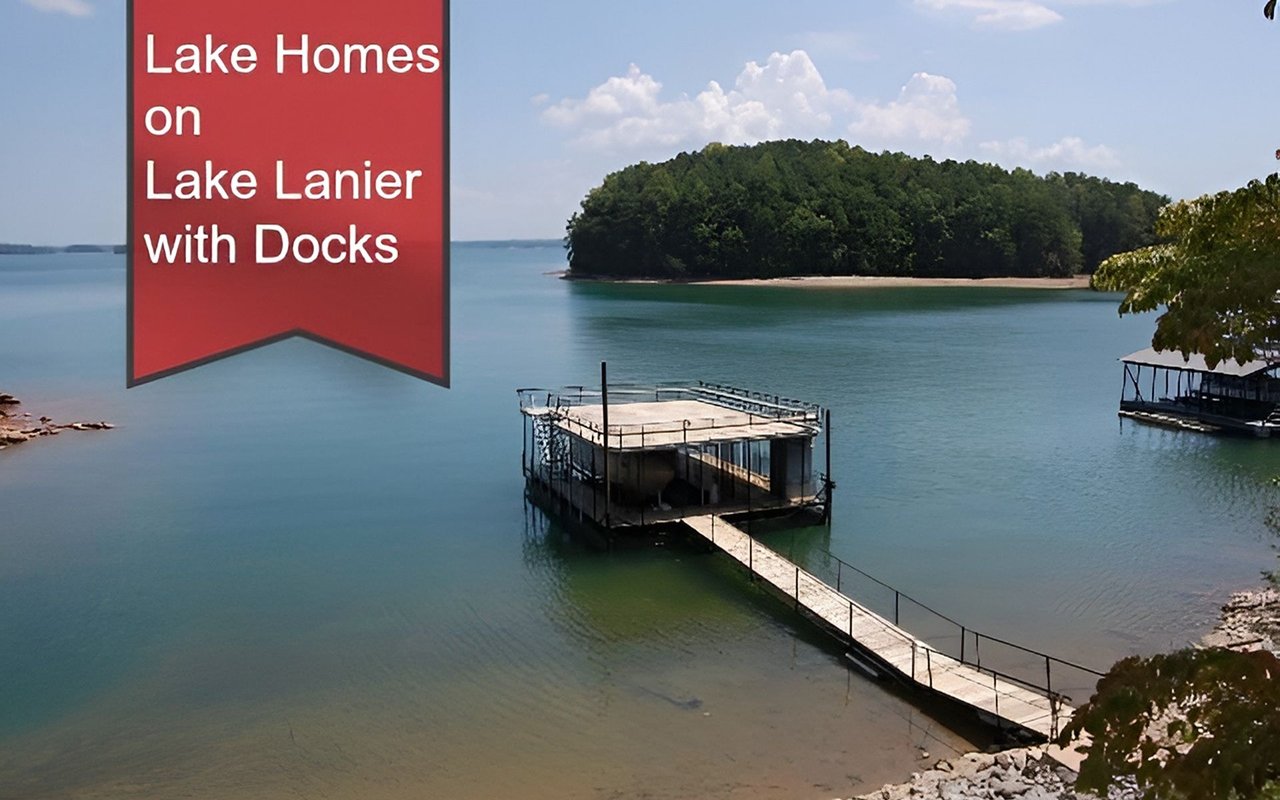 Lake Lanier with a covered dock and walkway extending over the water toward a wooded island.