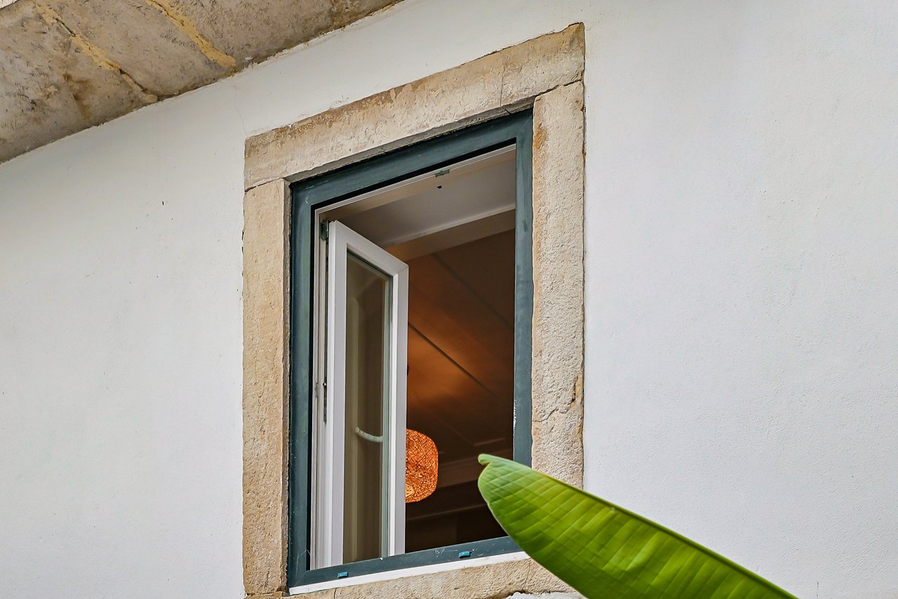 Trendy 1-Bedroom Duplex with Private Terrace in Lisbon’s Historic Heart