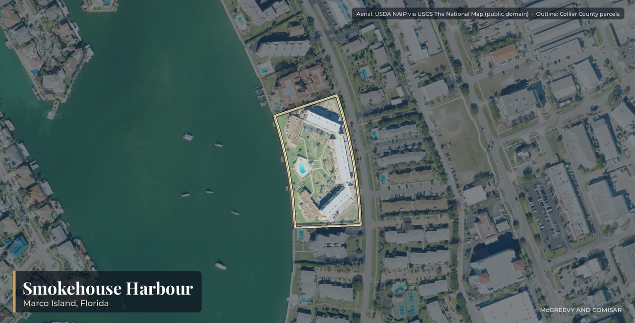 Aerial view of Smokehouse Harbour on Marco Island, Florida, the four-story condominium wings at 730 and 750 West Elkcam Circle on Smokehouse Bay