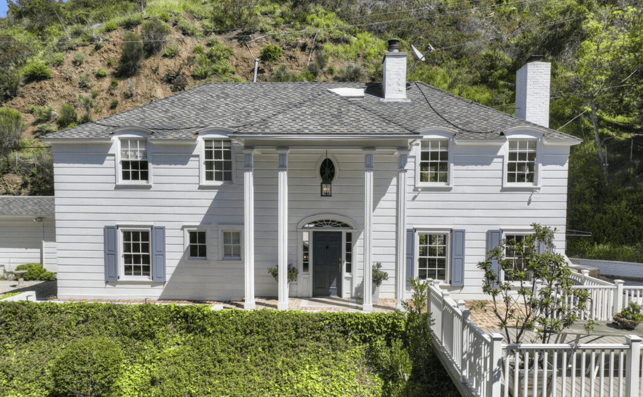 Alt Image Text (SEO Optimized): Lindsay Lohan’s gated Beverly Hills estate at 1500 San Ysidro Drive, represented by luxury real estate agent Brendan Brown.